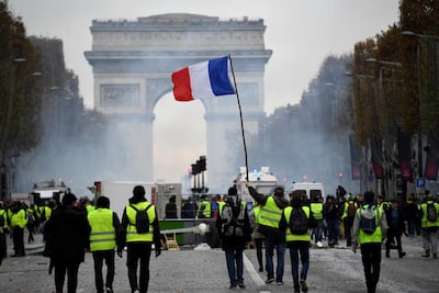 Gilet jaunes protestors on the Champs Elysees in Paris, on November 24. Photo: AFP