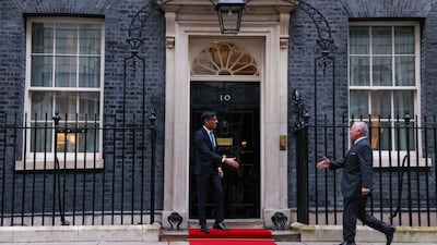 King Abdullah arrives at Downing Street. Bloomberg