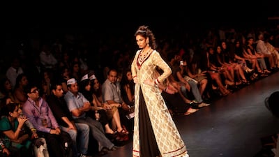 August 19, 2011: An Indian model displays creations by designers Shyamal and Bhumika during Lakme Fashion Week in Mumbai. AP Photo/Rajanish Kakade