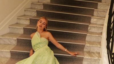 Kimberley Garner in a pistachio one-shouldered gown from the couture spring-summer 2022 collection. Photo: Rami Al Ali