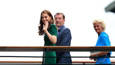 The Duchess of Cambridge arrives on day twelve of the Wimbledon Championships at the All England Lawn Tennis and Croquet Club, Wimbledon wearing a forest green Dolce & Gabanna dress. Photo: PA