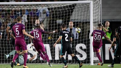 Manchester City's Nicolas Otamendi (30) shoots. Jae C Hong / AP Photo
