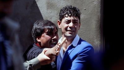 A man reacts as others comfort him at the site of a suicide attack in Kabul, Afghanistan on April 22, 2018. Omar Sobhani / Reuters