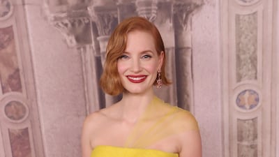 Jessica Chastain, in a floaty yellow Ralph Lauren sheer-strapped dress, attends the Ralph Lauren show during New York Fashion Week on September 7, 2018. AFP