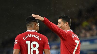 Manchester United's Cristiano Ronaldo celebrates scoring his team's second goal with Casemiro. AFP
