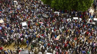 Sudanese protesters march in a mass demonstration against the country's ruling generals in the capital Khartoum's twin city of Omdurman.Ahmed Mustafa / AFP