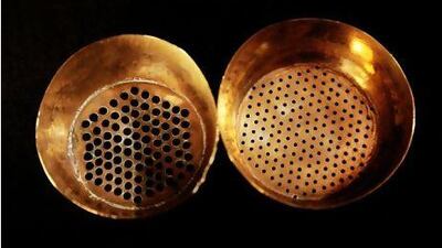These brass sieves, from Abu Dhabi, would have been an essential tool used by local merchants to sort the catch for resale.