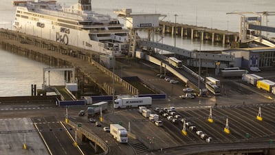 Lorries leave a passenger and cargo ship at the Port of Dover in England on January 30. Bloomberg