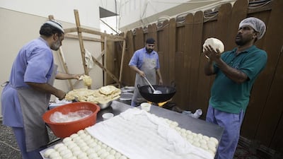 Cooks prepare meals at the consultate.