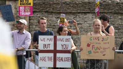Protesters gather at the gates of Blenheim Palace. Getty Images