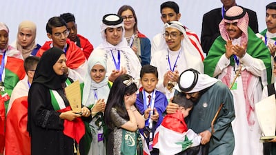Sheikh Mohammed bin Rashid, Vice President and Ruler of Dubai, with winners of the Arab Reading Challenge