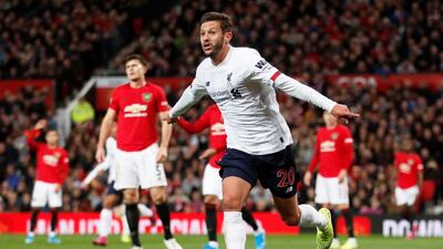 Liverpool's Adam Lallana celebrates scoring the equaliser against Manchester United at Old Trafford. AFP