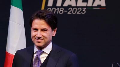 Giuseppe Conte attends a meeting in Rome. Italian media describe Mr Conte as most likely to be the choice of Italy's main populist leaders to head the coalition government they hope to form. Alessandra Tarantino / AP