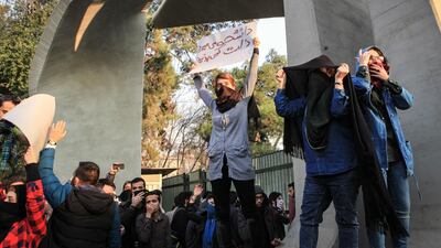 Iranian students protest at the University of Tehran during a demonstration driven by anger over economic problems, in the capital Tehran on December. AFP