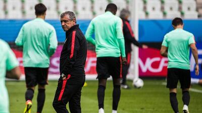 Portugal’s coach Fernando Santos looks on during a training session at the Geoffroy-Guichard Stadium in Saint-Etienne, central-eastern France, on June 13, 2016, on the eve of their Euro 2016 football tournament match against Iceland. Odd Andersen / AFP