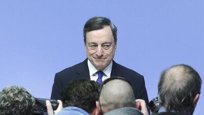 The president of the European Central Bank, Mario Draghi. The ECB’s current monthly pace of asset purchases of 80 billion per month will drop to 60 billion from this month. Michael Probst / AP Photo