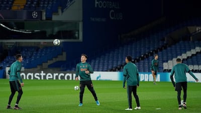 A general view of Ajax players during a training session at Stamford Bridge. PA