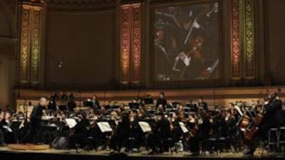 Michael Tilson Thomas rehearses the YouTube symphony Orchestra at Carnegie Hall in New York.