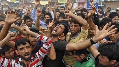 Kashmiri Shiite Muslims shout religious slogans as they take part in a protest against the ongoing conflict in Iraq, at Narbal, India. Danish Ismail / Reuters
