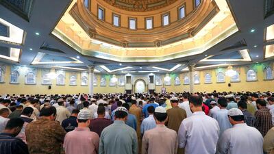 Prayers at the Masjid Bani Hashim mosque. Victor Besa/The National