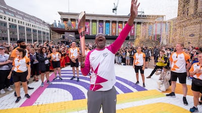 Sir Lenny holds the baton aloft in Birmingham. Getty Images