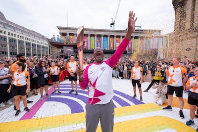 Sir Lenny Henry takes part in The Queen's Baton Relay as it visits Birmingham. Getty