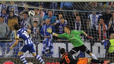 Espanyol's Joan Verdu scores against Valencia.