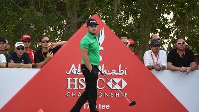 Tyrrell Hatton stands on the 17th tee during the third round of the Abu Dhabi HSBC Championship. Ross Kinnaird / Getty Images