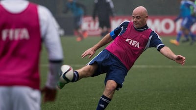 New Fifa president Gianni Infantino shoots the ball during a Fifa Team Friendly Football Match at the Fifa headquarters on February 29, 2016 in Zurich, Switzerland. (Photo by Philipp Schmidli/Getty Images)