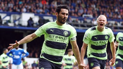Ilkay Gundogan celebrates scoring Manchester City's first goal in their 3-0 Premier League win over Everton at Goodison Park on May 14, 2023. Reuters