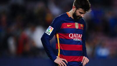 Barcelona defender Gerard Pique shown during his team's loss to Valencia in La Liga on Sunday. David Ramos / Getty Images / April 17, 2016