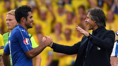 Italy Eder (L) and coach Antonio Conte celebrate after their Euro 2016 Group E win over Sweden on Friday night. Pascal Guyot / AFP / June 17, 2016