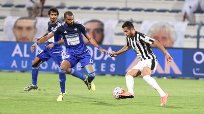 Al Nasr (blue) vs Al Jazira (black/white) battle in a Arabian Gulf League ( AGL ) football match on Thursday March 10, 2016. Courtesy Arshad Khan Aboobaker / AGL