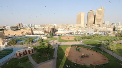 People sit at Al Futah Park, after the government lifted coronavirus disease (COVID-19) lockdown restrictions, in Riyadh, Saudi Arabia July 5, 2020. Reuters