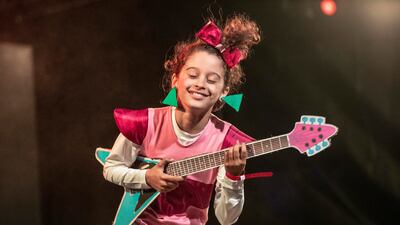 A young girl participates in the cosplay competition.