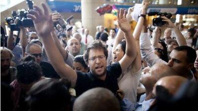 Israeli police arrest local left-wing activists at Ben Gurion airport near Tel Aviv. A group of Israeli protesters gathered to welcome 'Pro-Palestinian Fly-In' activists who travelled in a mass attempt to try to visit the West Bank. Uriel Sinai / Getty Images