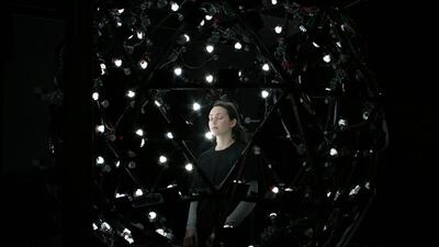 The actress Emily O'Brien as she's scanned from multiple angles in order to create a digital puppet. Courtesy Paul Debevec