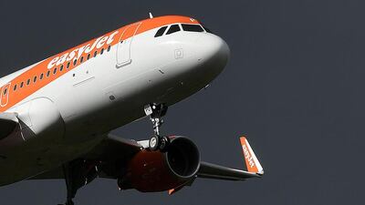 An easyJet plane approaches Gatwick Airport in southern England. The budget carrier sees further turbulence ahead. Toby Melville / Reuters