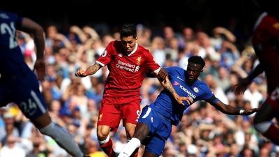 Striker: Roberto Firmino (Liverpool) – Salah’s selfless foil scored more goals than ever before, created plenty and helped reinvent the striker’s role with relentless pressing. Julian Finney / Getty Images