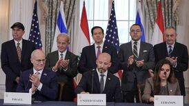 Israel's ambassador to the US Yechiel Leiter, US State Department counsellor Daniel Holler and Lebanese ambassador to the US Nada Hamadeh sign a framework agreement at the State Department in Washington. Reuters