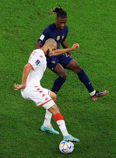 Tunisia’s Aissa Laidouni battles France’s Eduardo Camavinga for possession during the 2022 Fifa World Cup match at Education City Stadium. Taqtaqah describes quick, sharp passing and rapid exchanges of play. Getty Images