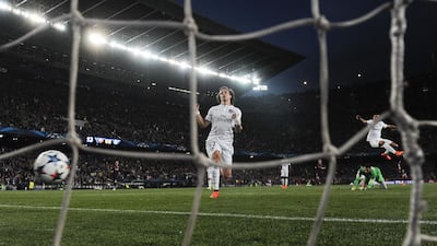 Paris Saint-Germain’s David Luiz, centre, reacts to Neymar’s first goal in PSG's Champions League loss to Barcelona on Tuesday. Josep Lago / AFP