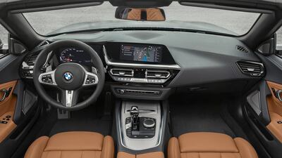 The revamped roadster dispenses with the folding metal lid of its predecessor in favour of a traditional soft-top. BMW