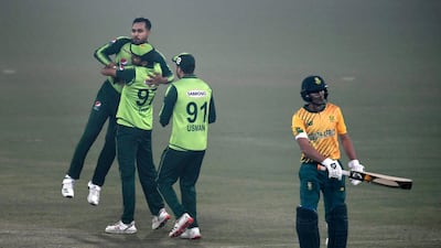 Pakistan's players celebrate after winning the first T20 against South Africa at the Gaddafi Cricket Stadium in Lahore on Thursday, February 11, 2021. AFP