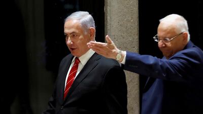Israeli President Reuven Rivlin and Prime Minister Benjamin Netanyahu arrive to a nomination ceremony at the president's residency in Jerusalem September 25, 2019. Reuters
