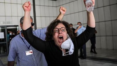 Magda Fyssa, mother of anti-racist Greek rapper Pavlos Fyssas, reacts after the trial. Reuters