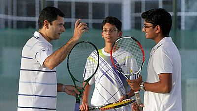 Zeeshan Ali instructs Sandip Roy and Adarsh Ramesh at the Dubai Modern High School.