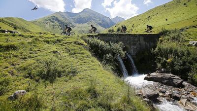 Riders of Team Sky lead the peloton during Stage 8 of the 103rd Tour de France cycling race over 184km between Pau and Bagneres-de-Luchon, France, 09 July 2016. Yoan Valat / EPA