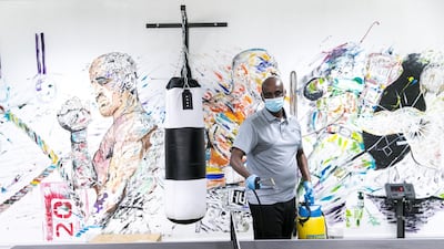 Gym equipment is sanitised between uses. Reem Mohammed / The National