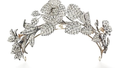 The tiara is designed as an arched foliate spray with three flower heads mounted en tremblant. Courtesy: Christie's
